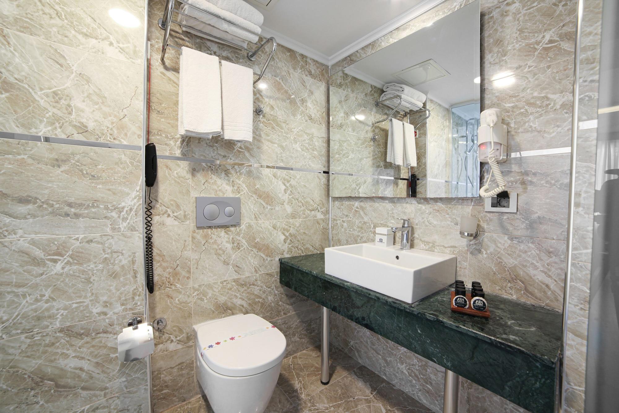 Deluxe Dreibettzimmer – kostenfreier Zugang zum Spa